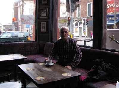 Pausing for coffee on the James Joyce trail, with Sweny's chemist in the background