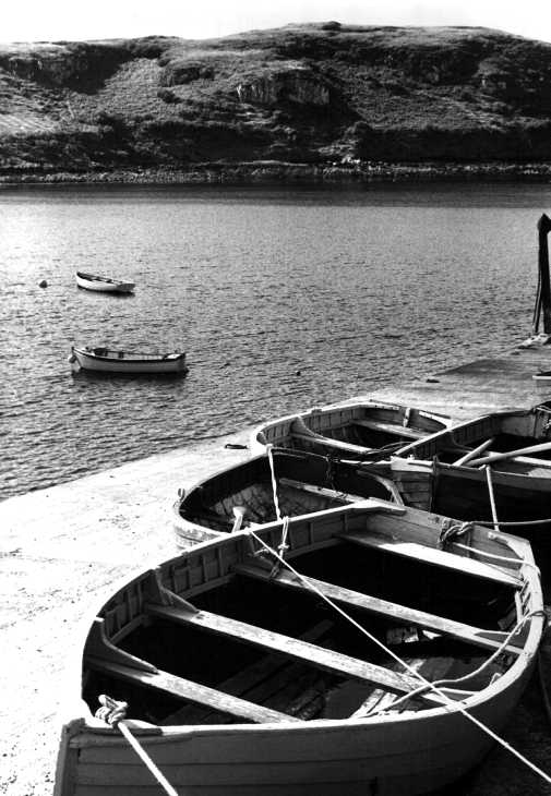 Rowing boats on jetty on The Isle of Skye