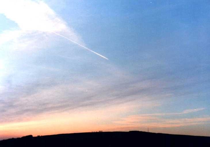 Jet trail in evening sky