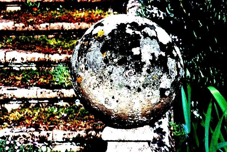 Concrete ball with lichen. Posterization
