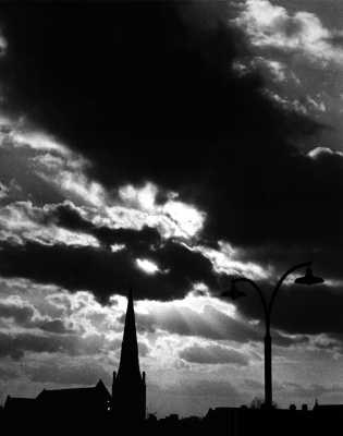Church spire and stormy sky