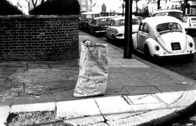 Girl playing in bag, West London